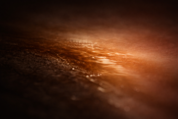 Abstract brown and black gradient with light reflections